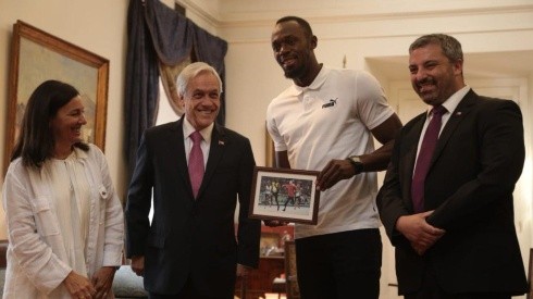Piñera le regaló un meme a Bolt donde salen ambos