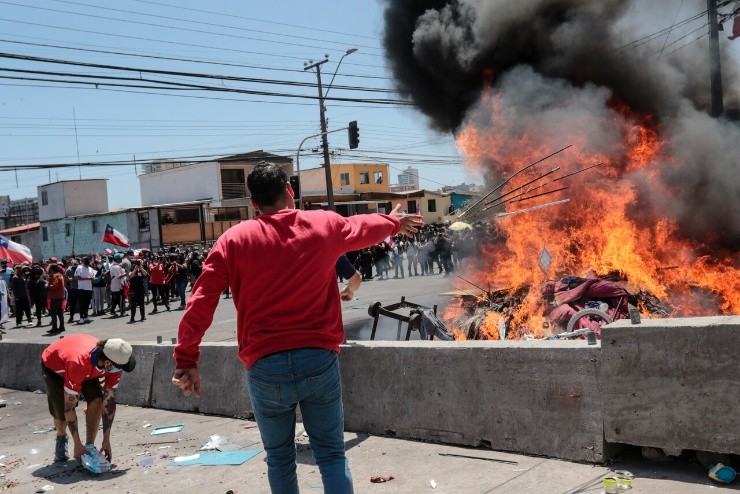 Pertencias de los inmigrantes quemadas en Iquique