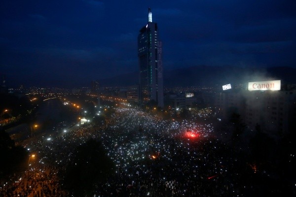 Vista nocturna de la marcha más grande la historia. (Getty Images)