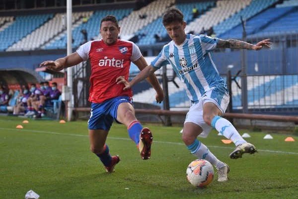 Armando Mendez of Nacional D Hector Fertoli of Racing Club - Photo by Marcelo Endelli/Getty Images-Not Released (NR)